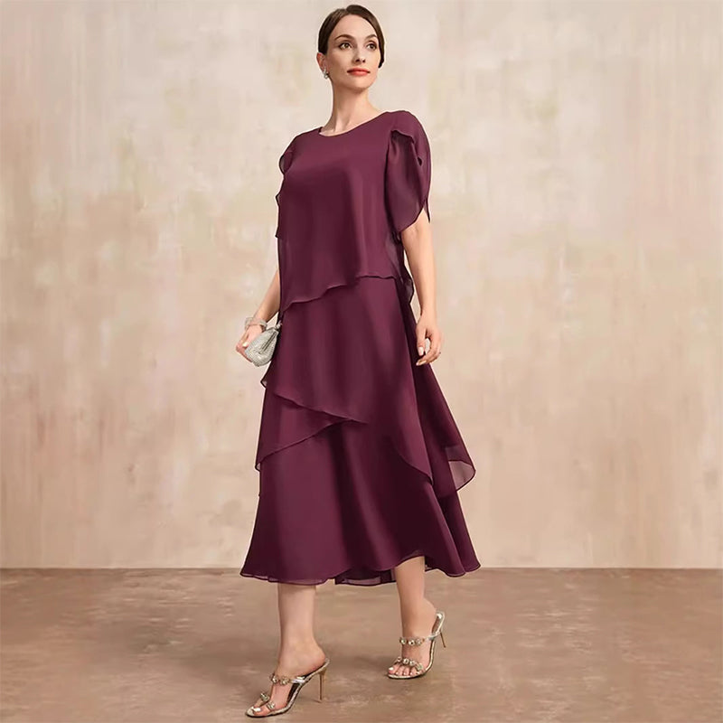 Elegantes Kleid mit Lagenlook und Flatterärmeln