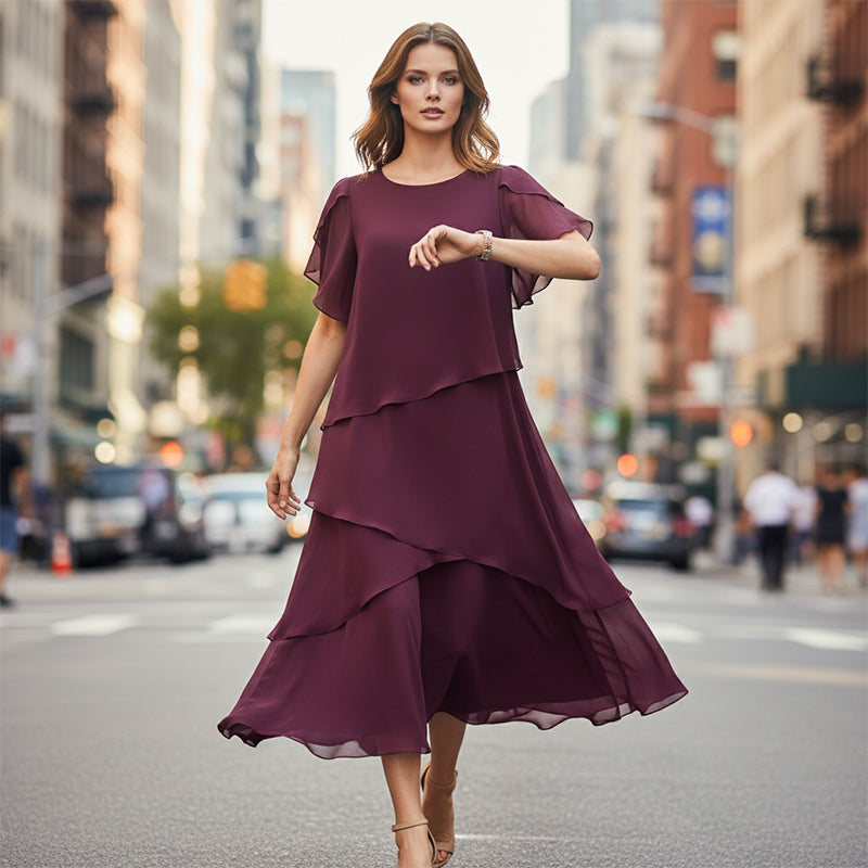 Elegantes Kleid mit Lagenlook und Flatterärmeln